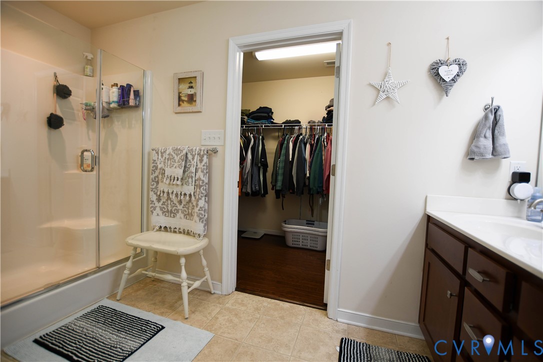 696 Anne Lane Aylett, VA 23009 - Photo 11 of 27 a walk in closet and a bathroom