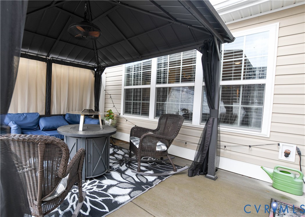 696 Anne Lane Aylett, VA 23009 - Photo 21 of 27 a view of a chairs and table in patio