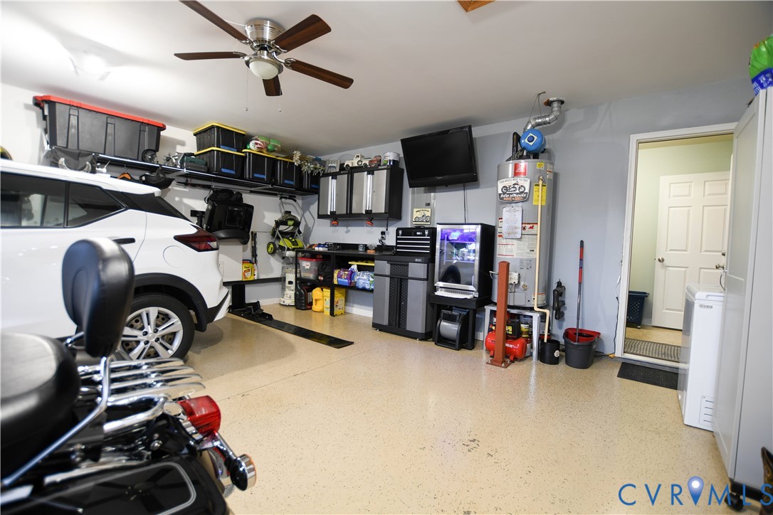 696 Anne Lane Aylett, VA 23009 - Photo 26 of 27 a view of a room with gym equipment