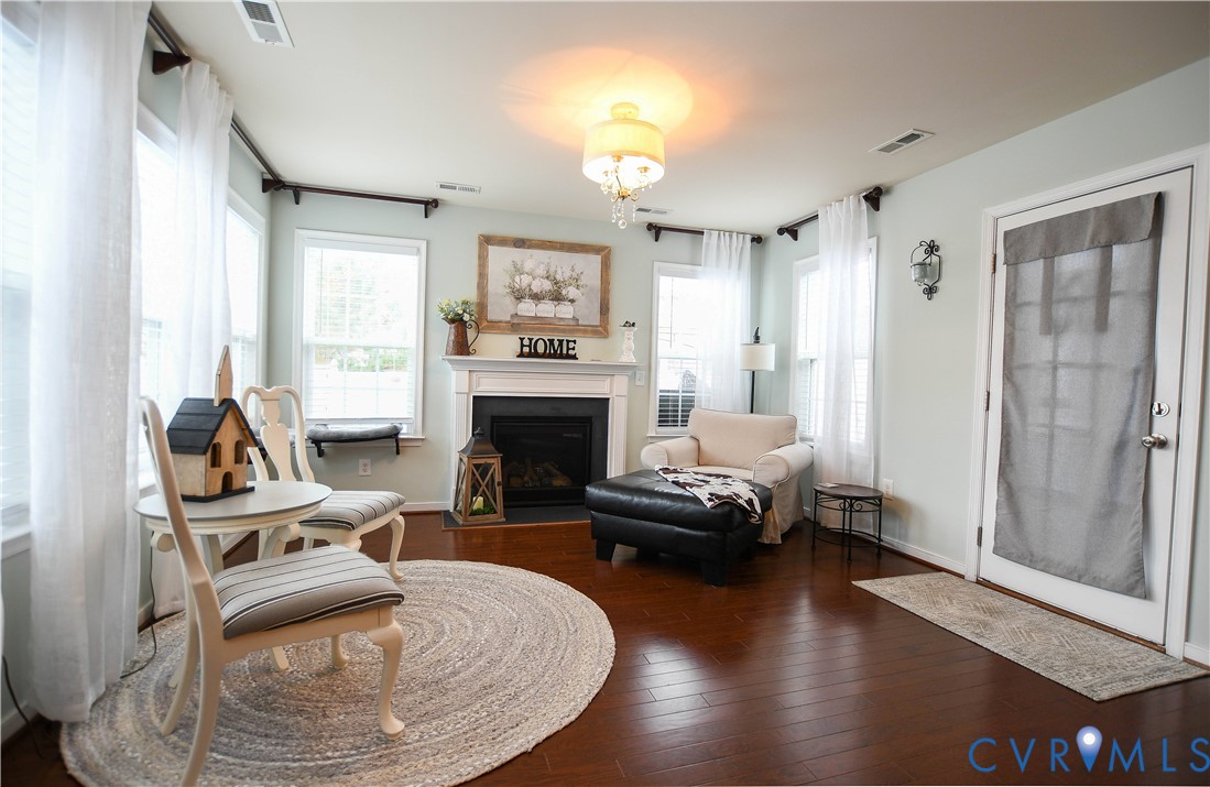 696 Anne Lane Aylett, VA 23009 - Photo 3 of 27 a living room with furniture and a fireplace