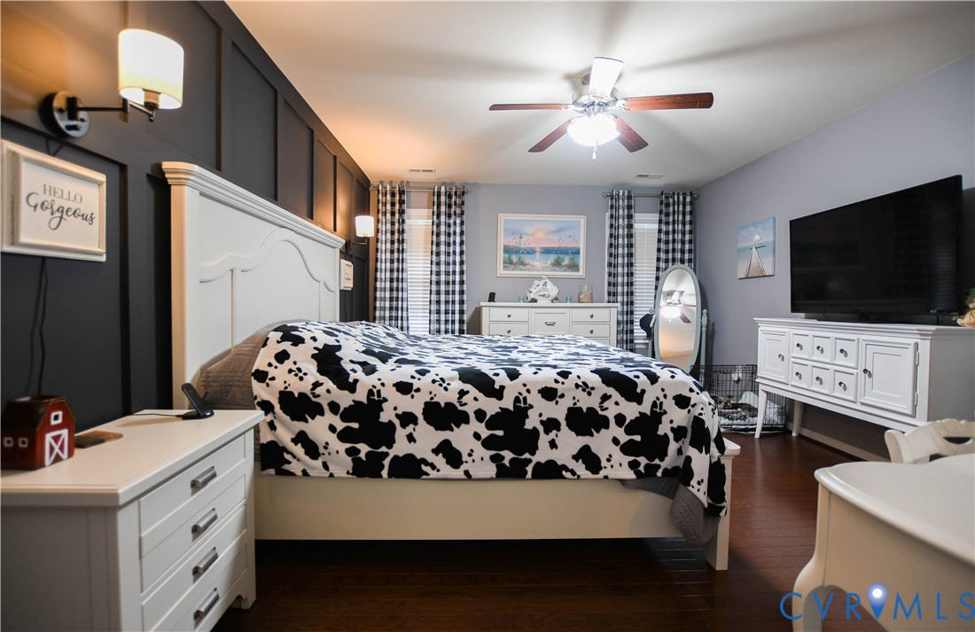 696 Anne Lane Aylett, VA 23009 - Photo 10 of 27 a bedroom with a bed and a flat screen tv