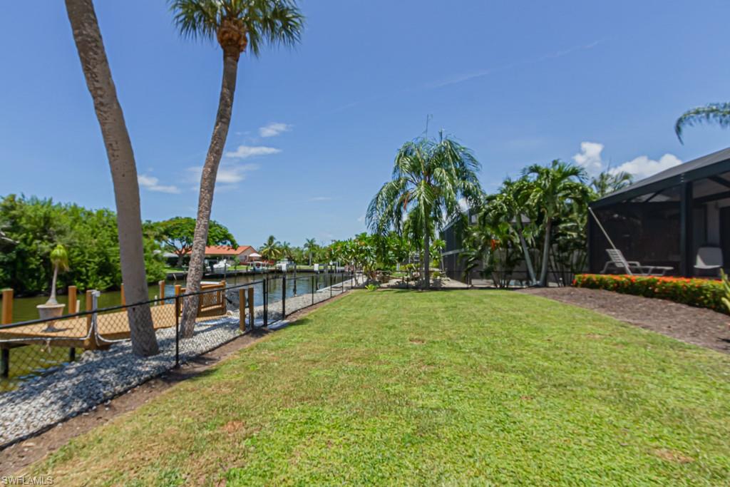 410 Panay Avenue Naples, FL 34113 - Photo 29 of 34 a view of a backyard with plants
