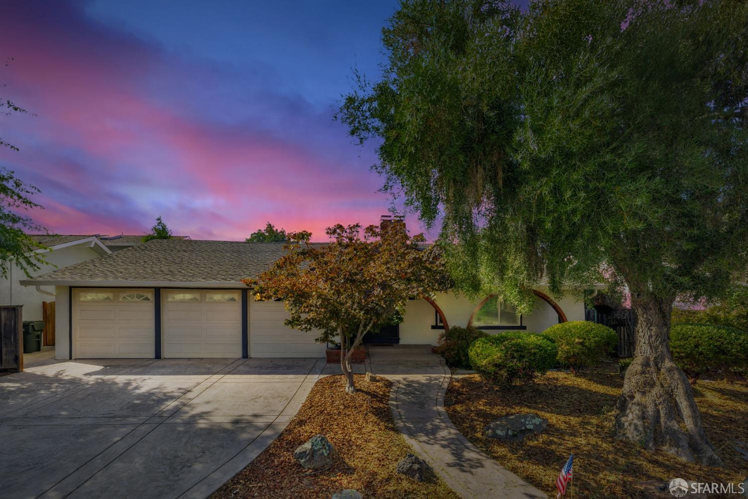 1467 Hudson Way Livermore, CA 94550 - Photo 1 of 48 a front view of a house with a yard and garage