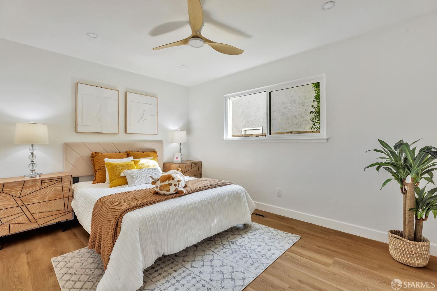 1467 Hudson Way Livermore, CA 94550 - Photo 19 of 48 a bedroom with bed and a potted plant