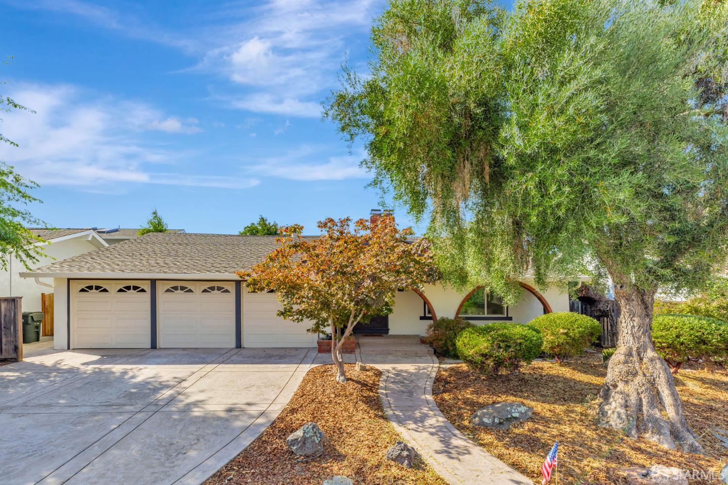 1467 Hudson Way Livermore, CA 94550 - Photo 2 of 48 a front view of a house with a yard and garage