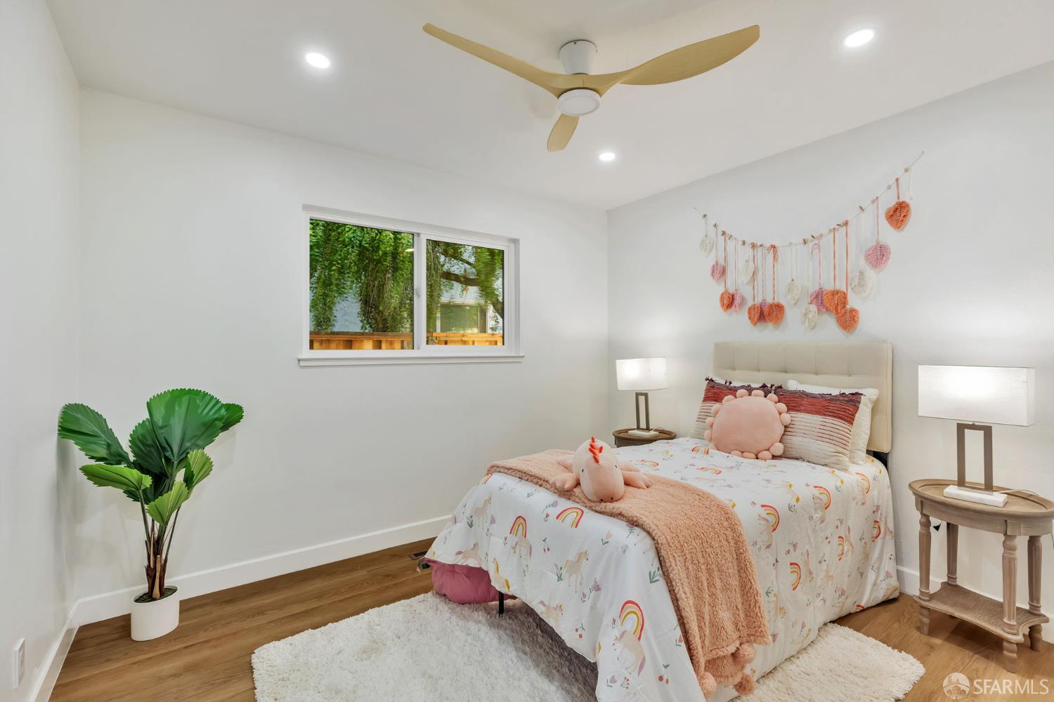 1467 Hudson Way Livermore, CA 94550 - Photo 23 of 48 a bedroom with a bed and a potted plant