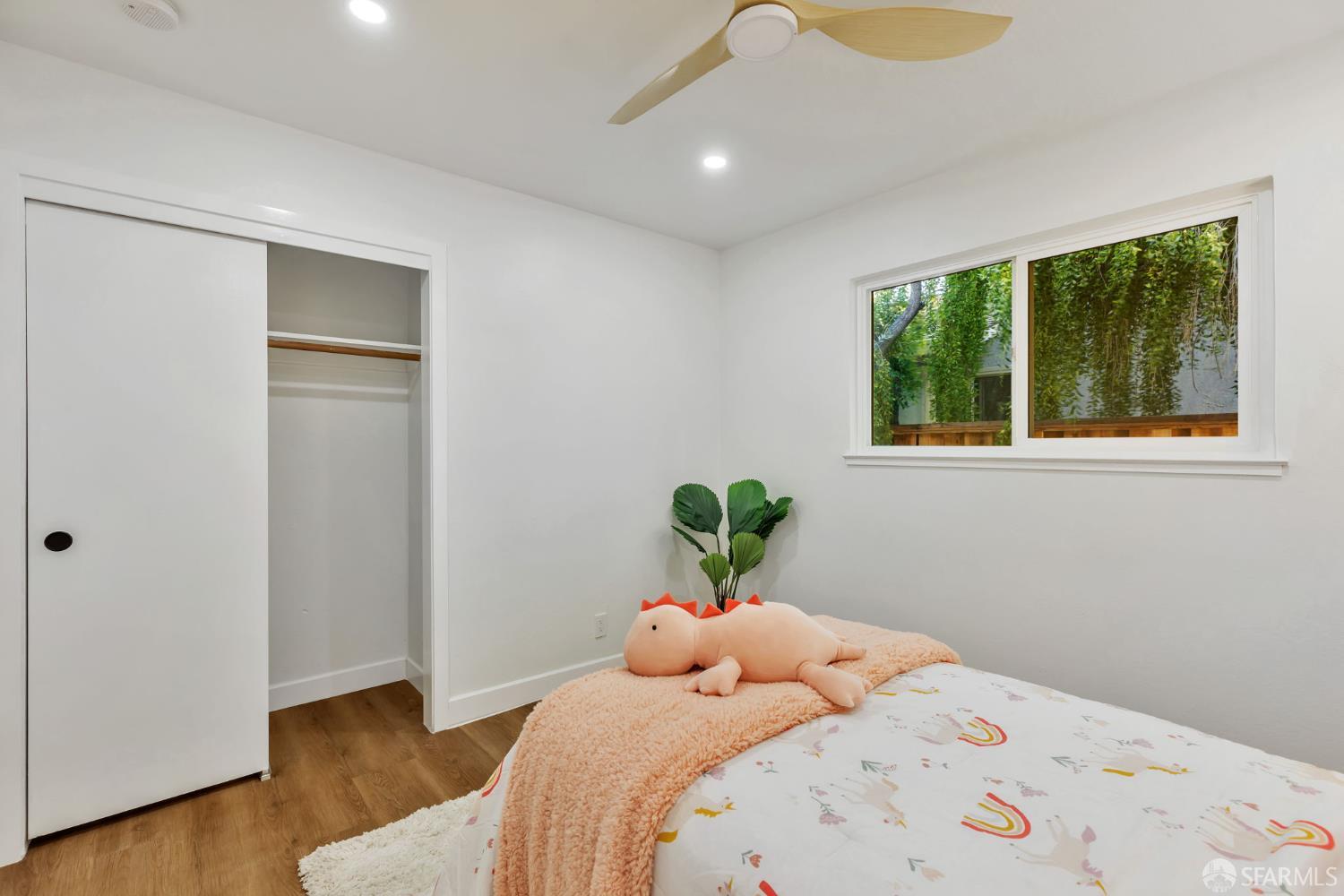 1467 Hudson Way Livermore, CA 94550 - Photo 24 of 48 a bedroom with a bed and a window with wooden floor