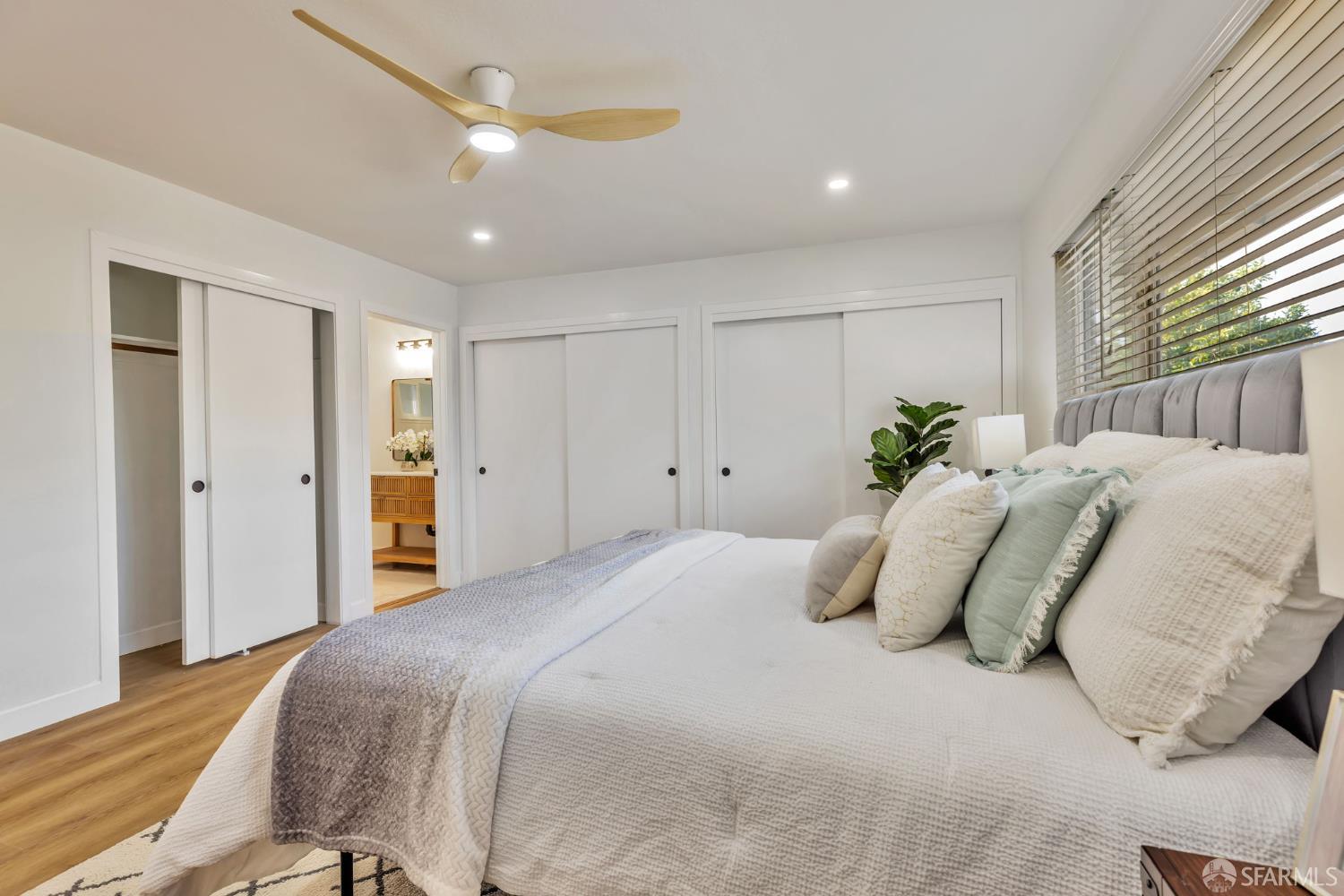 1467 Hudson Way Livermore, CA 94550 - Photo 27 of 48 a bedroom with a bed and ceiling fan