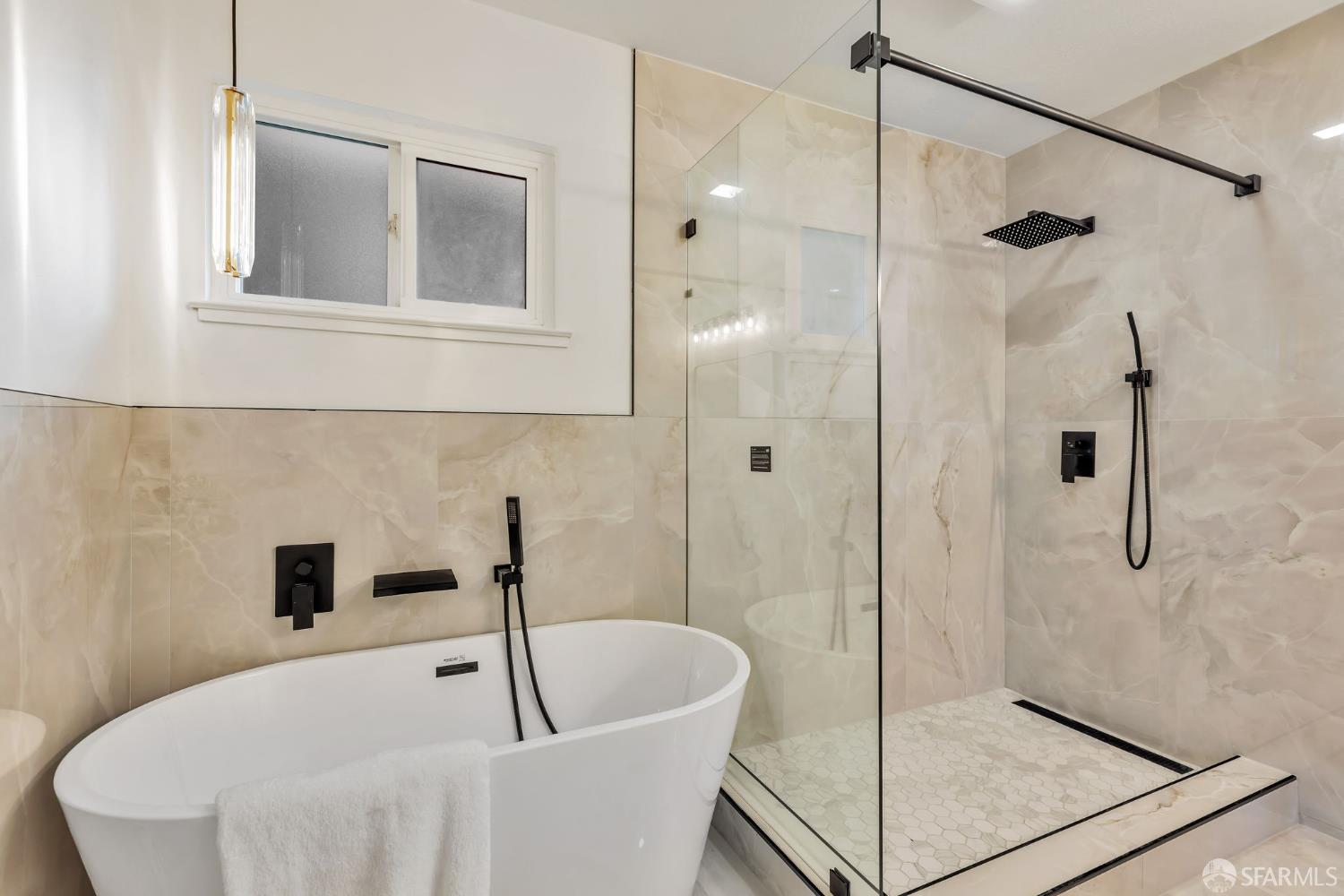 1467 Hudson Way Livermore, CA 94550 - Photo 30 of 48 a bathroom with a bathtub and shower