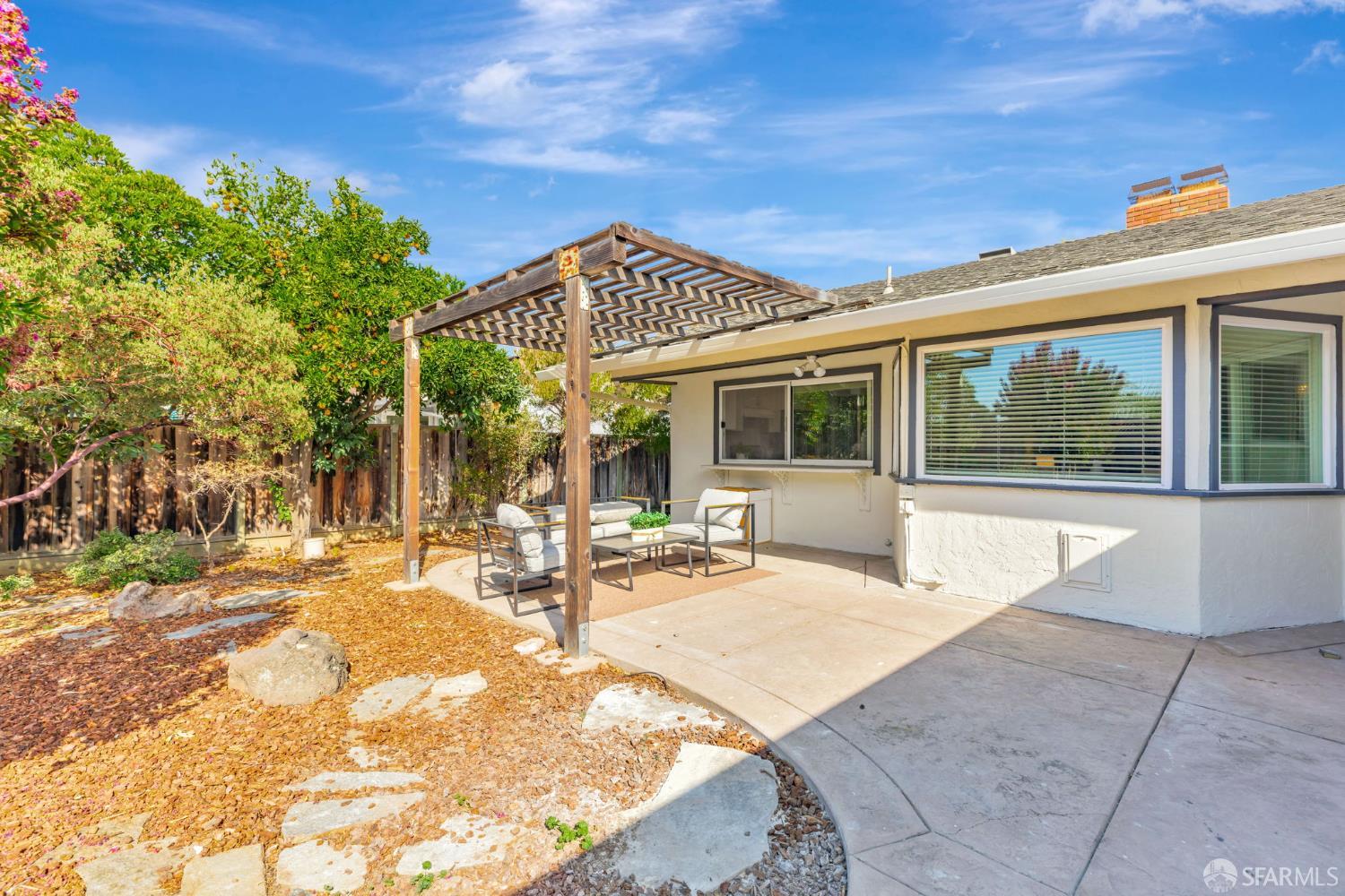 1467 Hudson Way Livermore, CA 94550 - Photo 33 of 48 a view of a house with backyard and sitting area