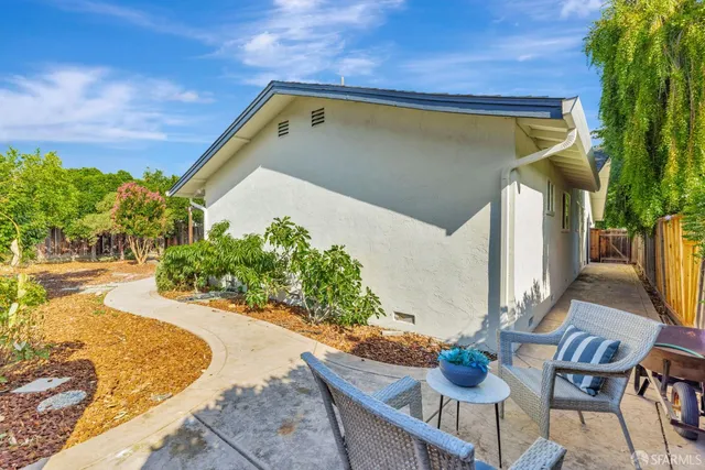 a house with outdoor sitting space