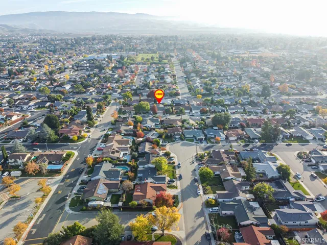 an aerial view of city and lake