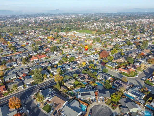 an aerial view of a city with lots of residential buildings