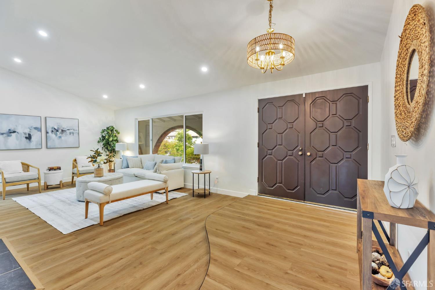 1467 Hudson Way Livermore, CA 94550 - Photo 7 of 48 a bedroom with a bed and a chandelier