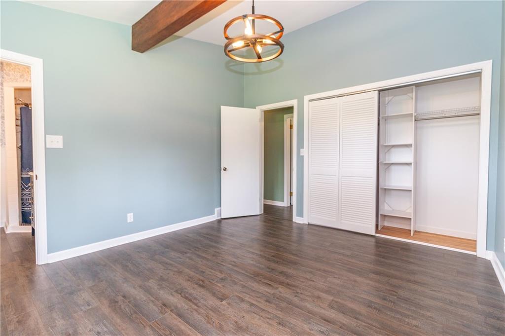 681 Bullcreek Road Butler, PA 16002 - Photo 20 of 39 a view of an empty room with wooden floor