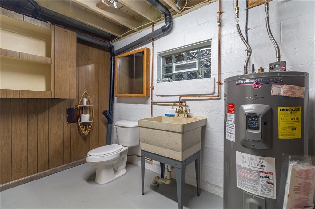 681 Bullcreek Road Butler, PA 16002 - Photo 25 of 39 a bathroom with a toilet sink and mirror