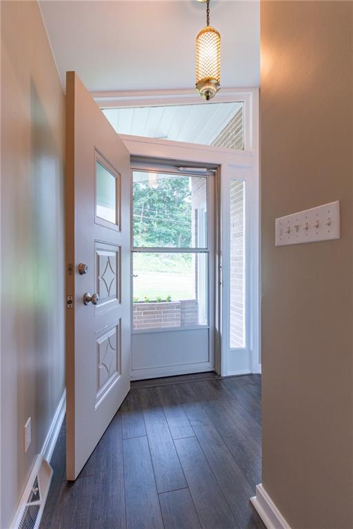 681 Bullcreek Road Butler, PA 16002 - Photo 3 of 39 a room with window and wooden floor