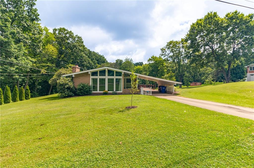 681 Bullcreek Road Butler, PA 16002 - Photo 38 of 39 a house view with swimming pool in front of it
