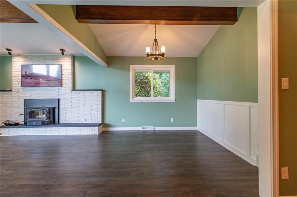 681 Bullcreek Road Butler, PA 16002 - Photo 6 of 39 wooden floor in an empty room with a window