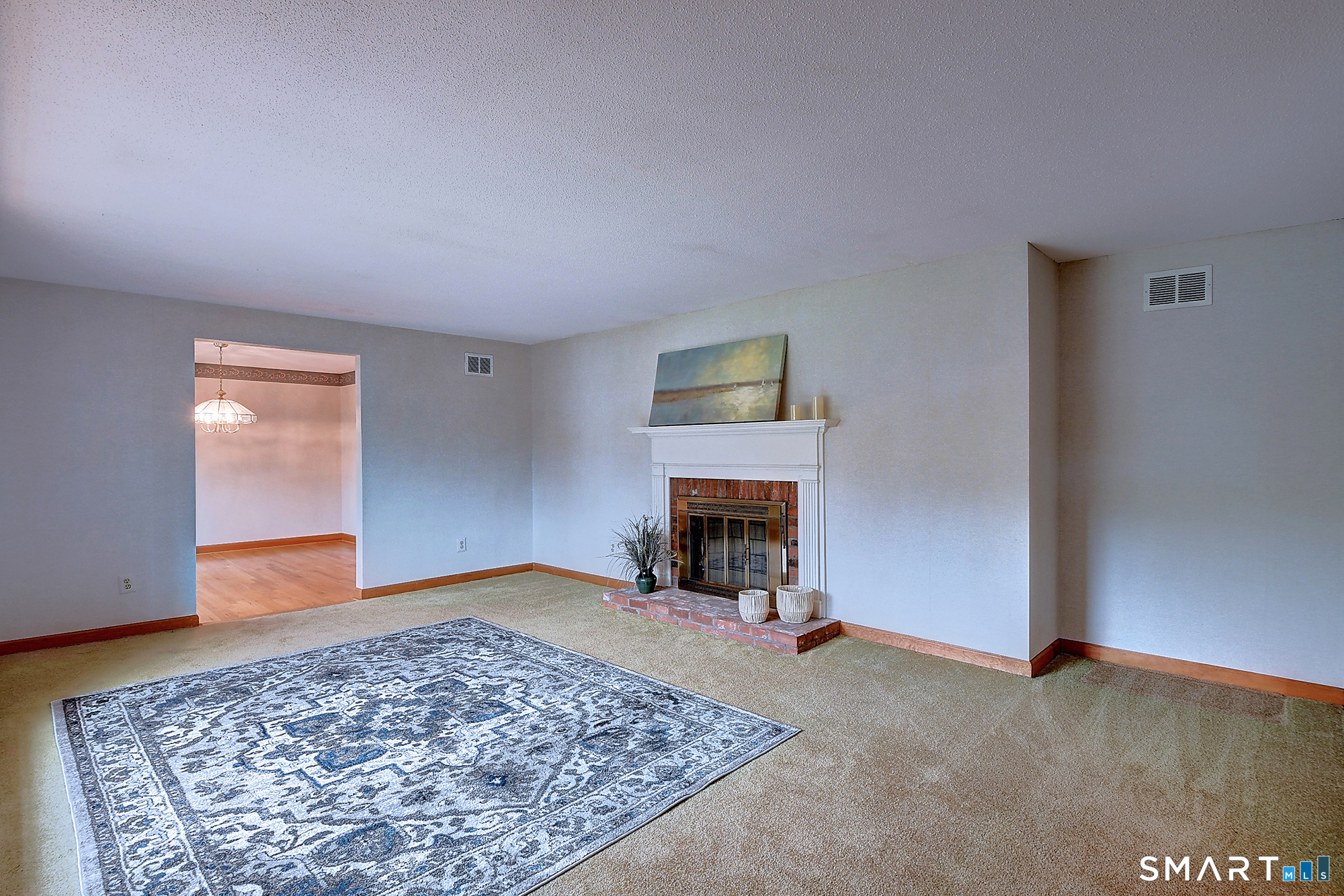 80 Grist Mill Road Wethersfield, CT 06109 - Photo 7 of 40 a view of a livingroom with a fireplace