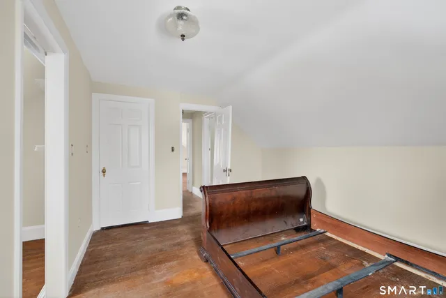 a view of room with a ceiling fan