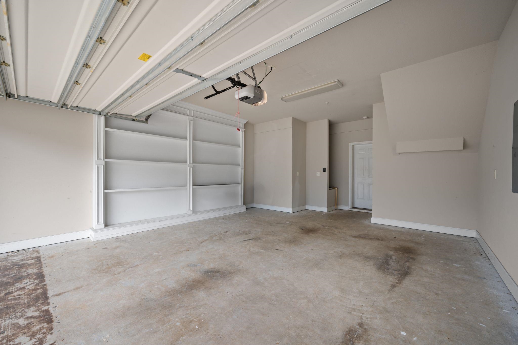 6903 Spaniel Drive, Unit B Daphne, AL 36527 - Photo 23 of 28 Garage