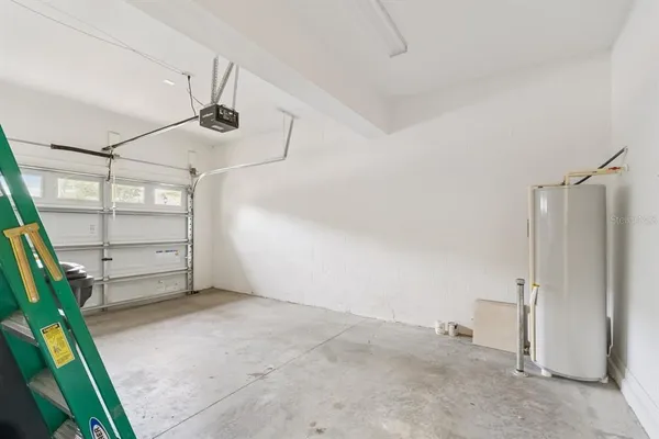 a view of a room with storage and utility room