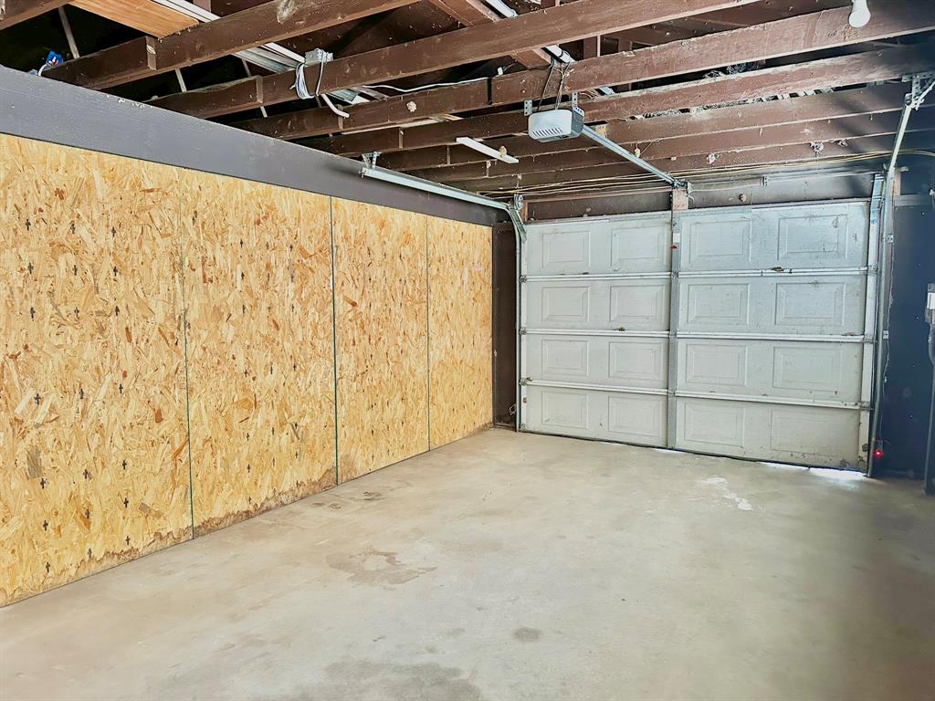 161 Elizabeth Street, Unit A Pottsboro, TX 75076 - Photo 19 of 20 a view of garage