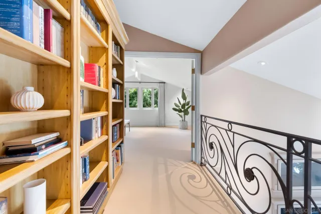 a view of a hallway with washer and dryer