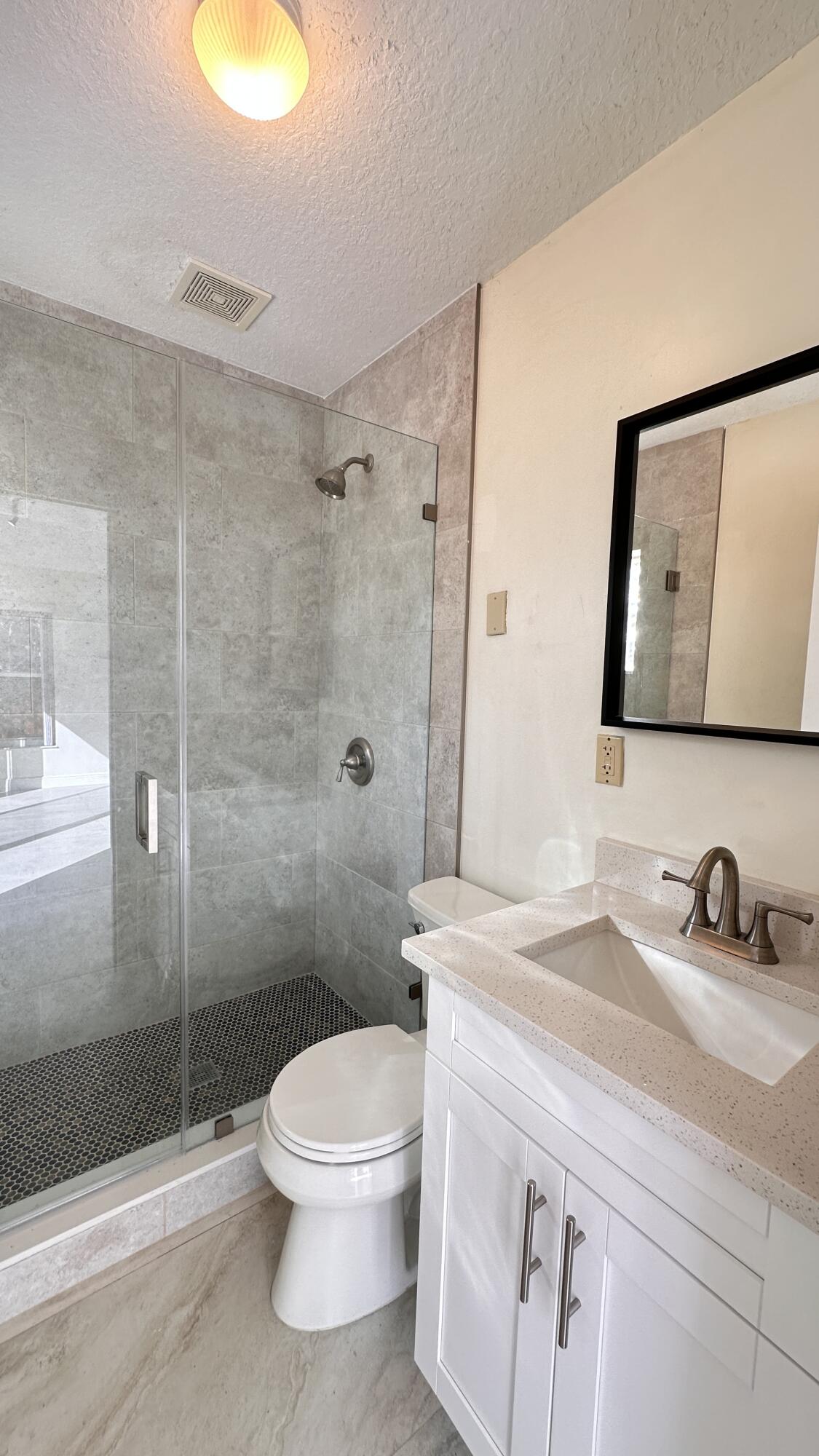 19010 Southwest 10th Street Pembroke Pines, FL 33029 - Photo 15 of 59 a bathroom with a sink a toilet and shower