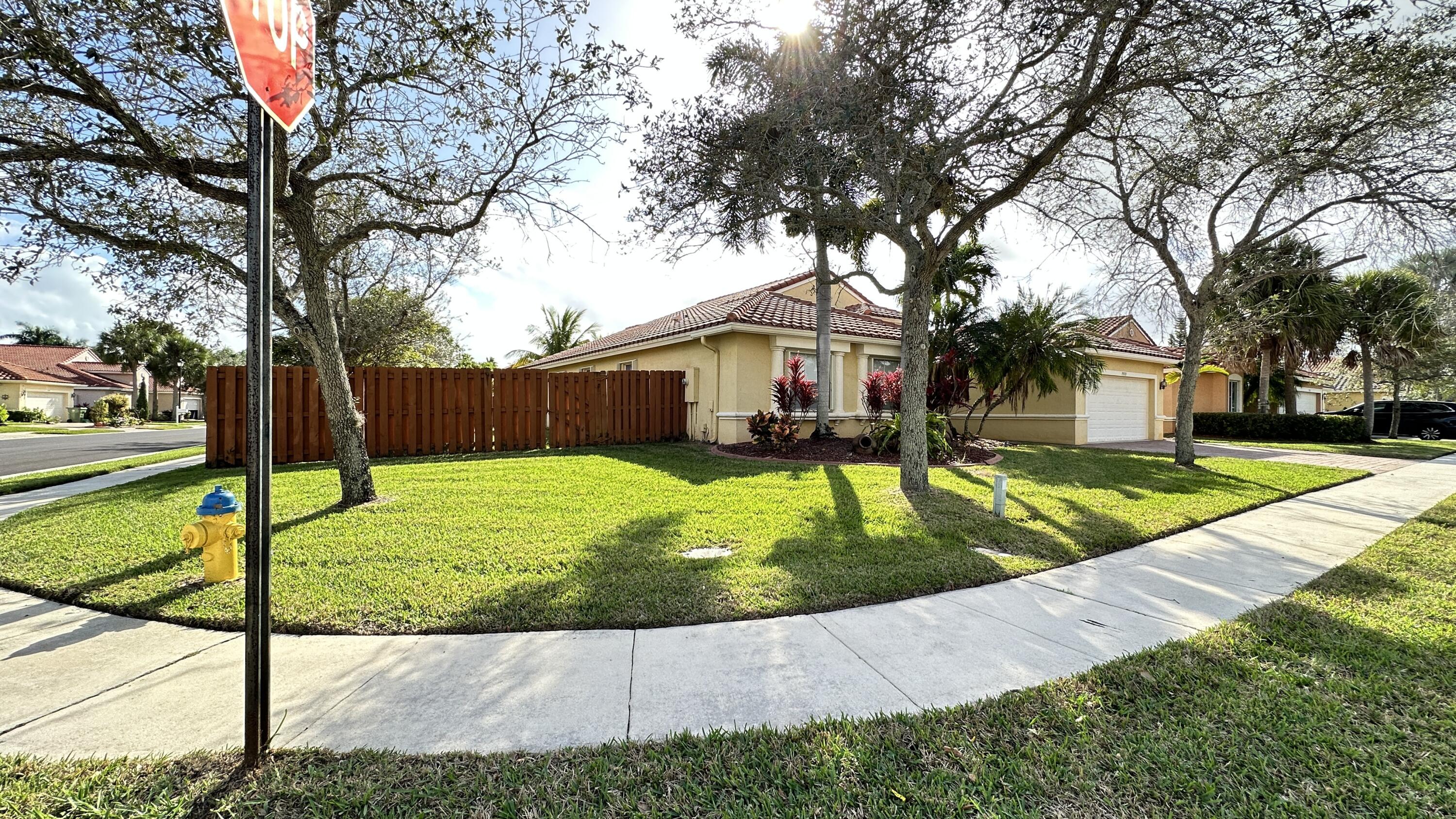 19010 Southwest 10th Street Pembroke Pines, FL 33029 - Photo 3 of 59 a view of a house with backyard
