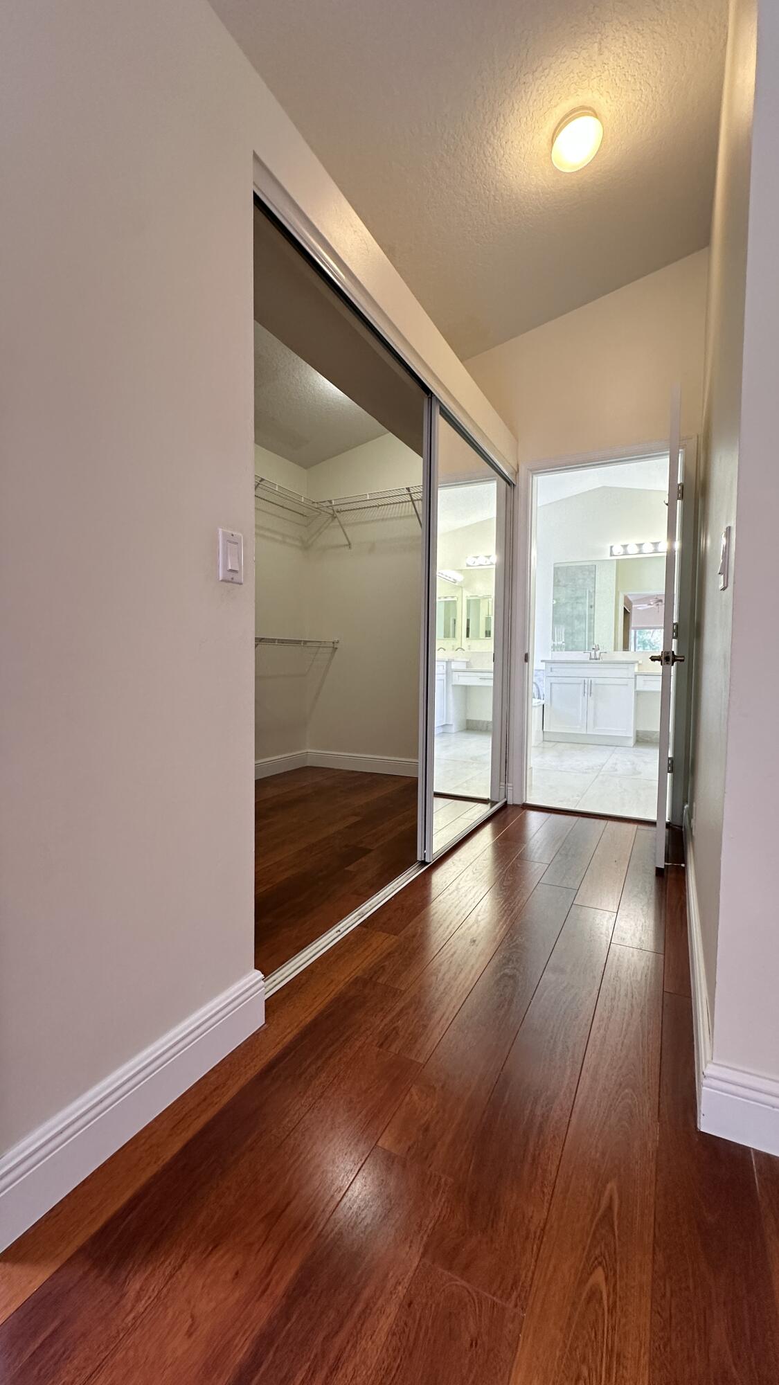19010 Southwest 10th Street Pembroke Pines, FL 33029 - Photo 37 of 59 an empty room with wooden floor and windows