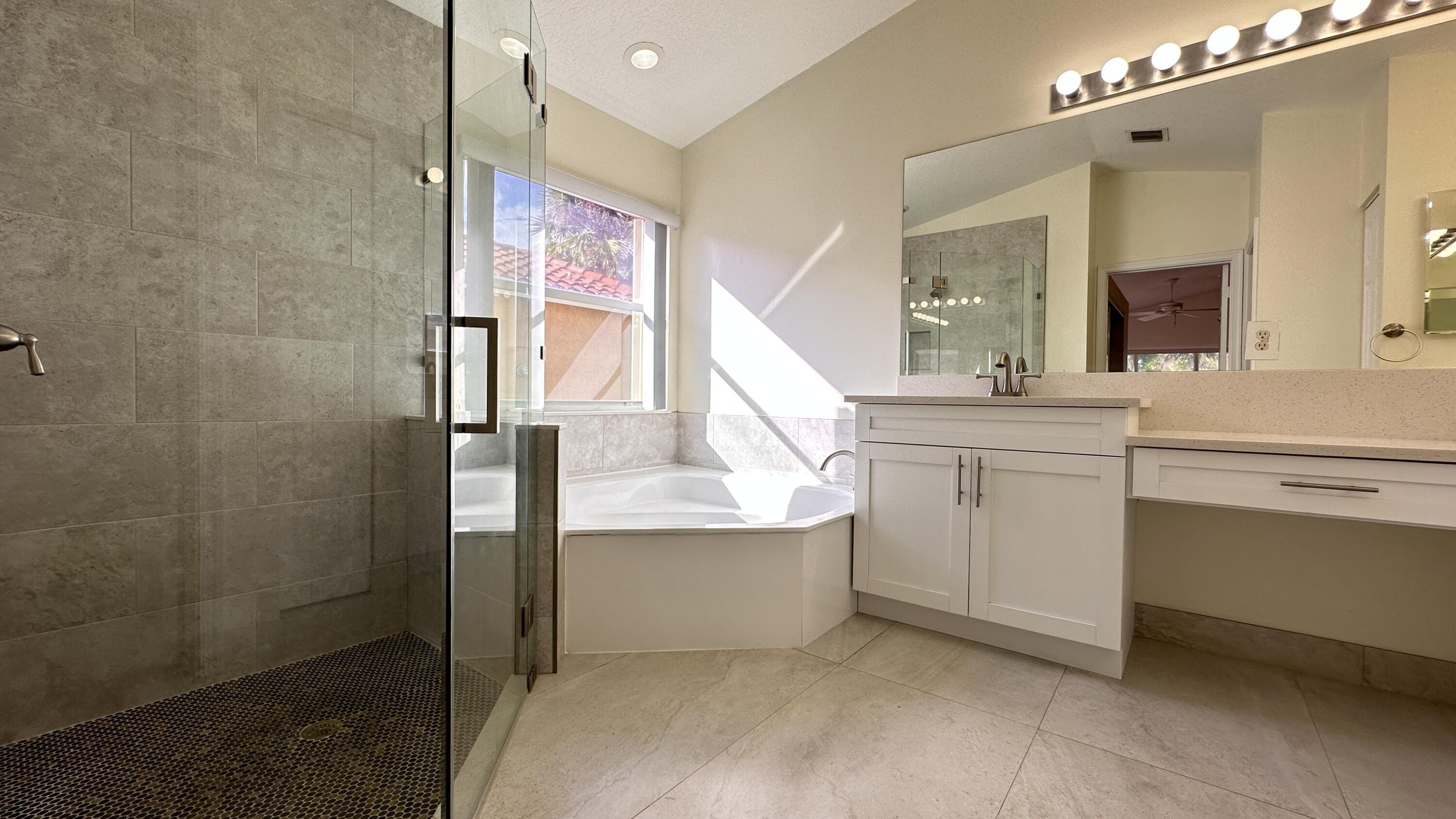 19010 Southwest 10th Street Pembroke Pines, FL 33029 - Photo 43 of 59 a bathroom with a sink and a mirror