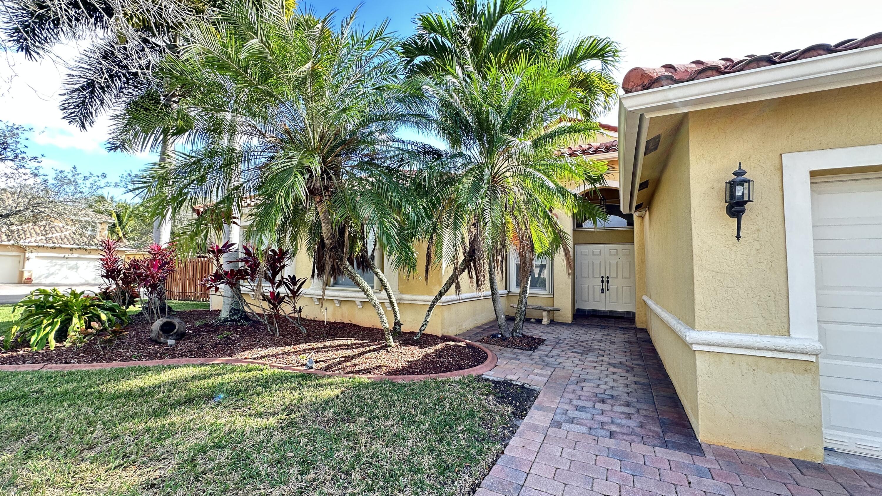 19010 Southwest 10th Street Pembroke Pines, FL 33029 - Photo 6 of 59 a view of a backyard with a small cabin