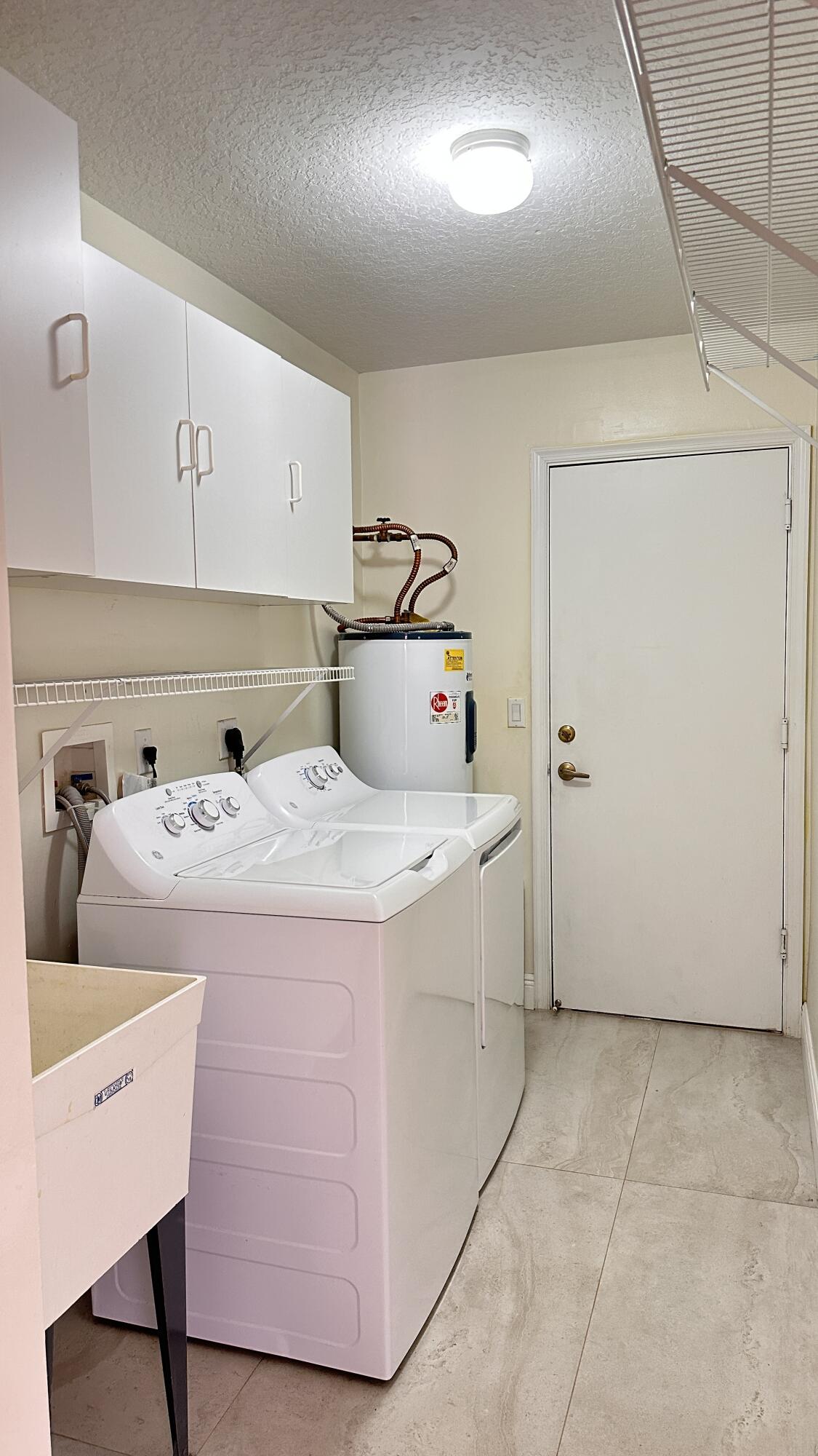 19010 Southwest 10th Street Pembroke Pines, FL 33029 - Photo 8 of 59 a utility room with dryer and washer