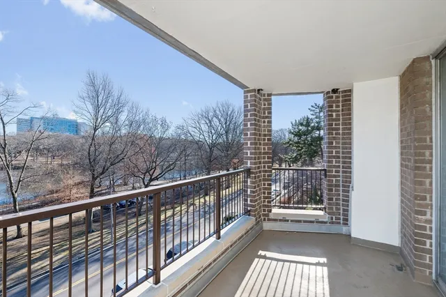 a view of balcony with a small yard