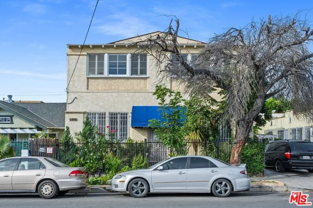 a car parked in front of a house