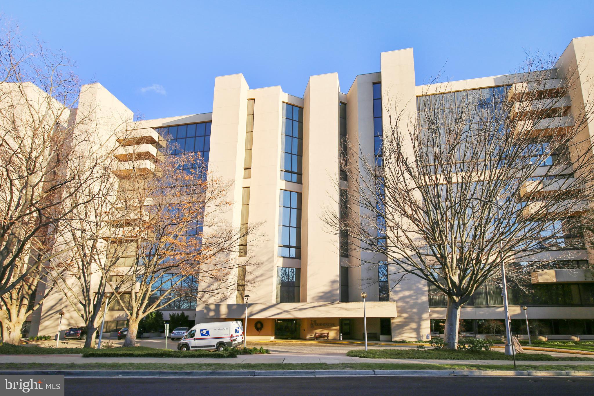 a view of a city with tall buildings
