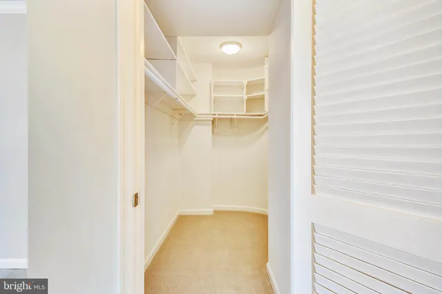 a bathroom with a toilet and a bathtub