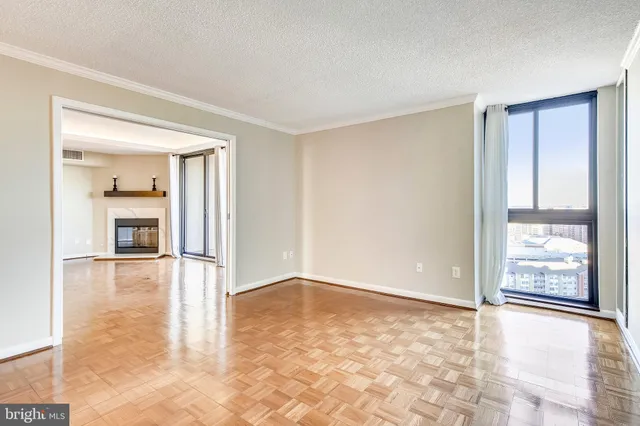 a view of a chairs and table in the balcony