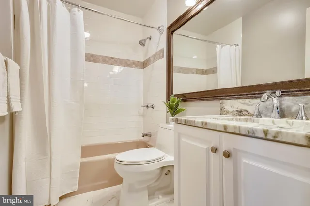 a view of a livingroom with furniture and white floor