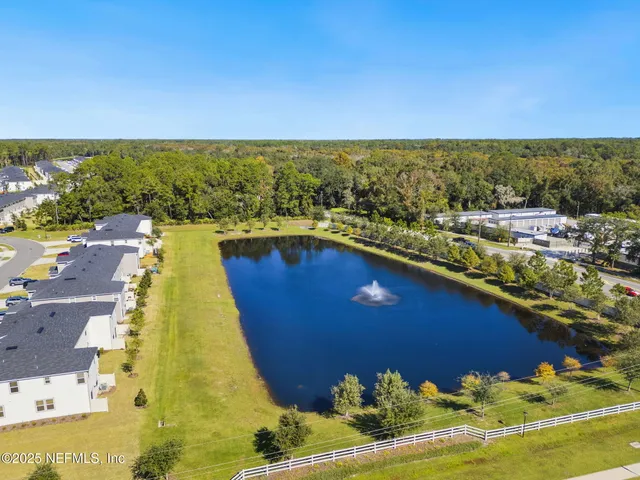 a view of a swimming pool with an ocean view
