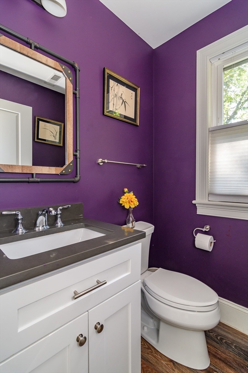 11 Leighton Street Natick, MA 01760 - Photo 12 of 27 a bathroom with a toilet a sink and mirror