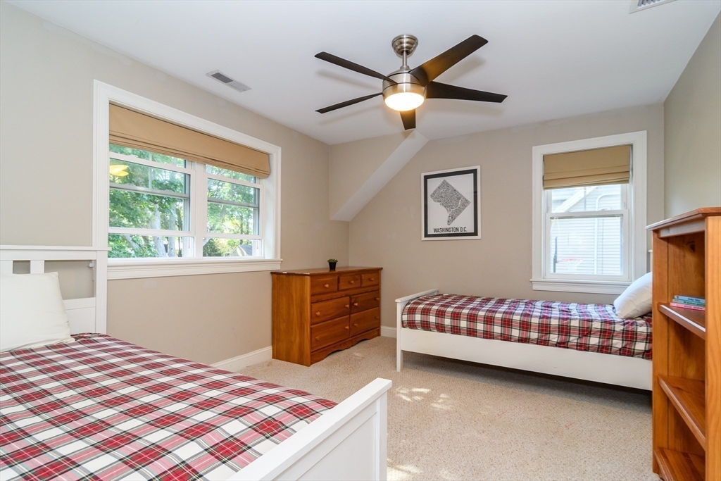 11 Leighton Street Natick, MA 01760 - Photo 18 of 27 a bedroom with a bed and a window