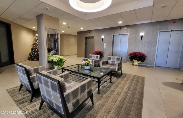 a view of a sign under a tree