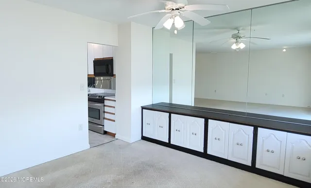 a kitchen with a stove microwave and refrigerator