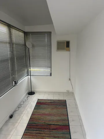 a hallway with a outdoor space