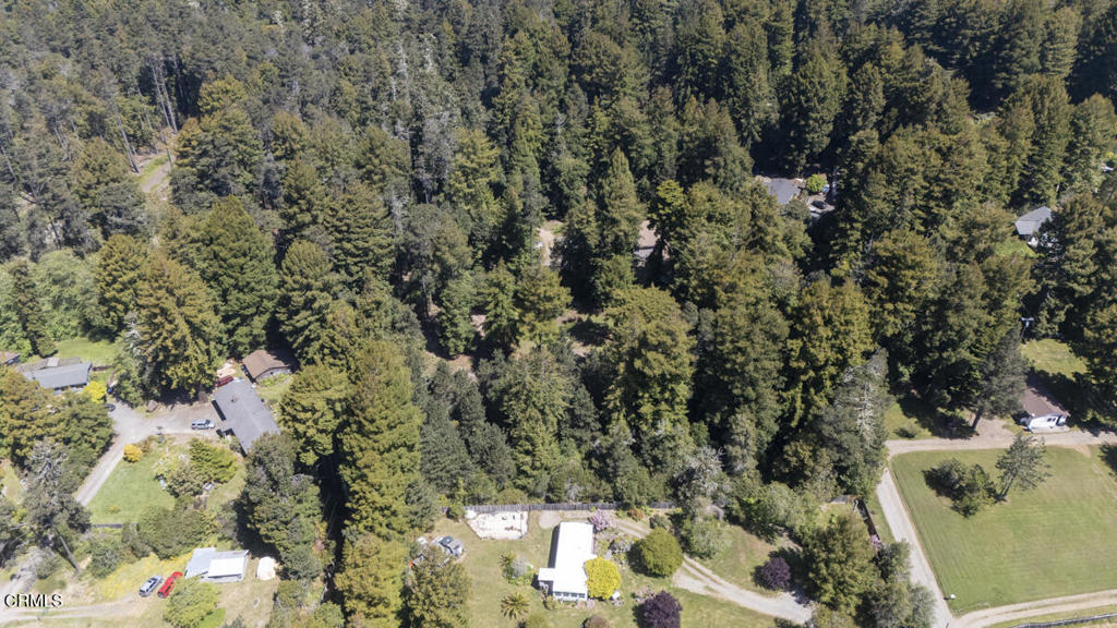 31320 Airport Road Fort Bragg, CA 95437 - Photo 9 of 14 a view of a house with a tree