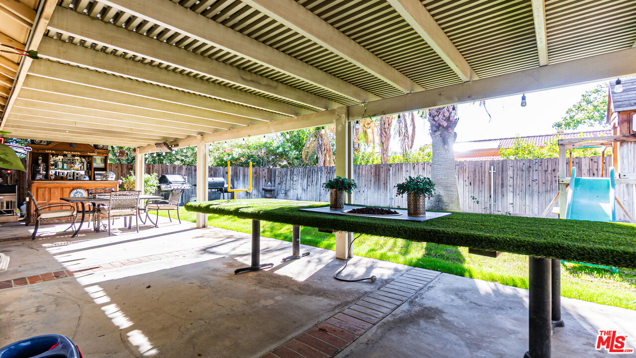 69817 Brookview Way Cathedral City, CA 92234 - Photo 22 of 38 a view of a swimming pool with a patio