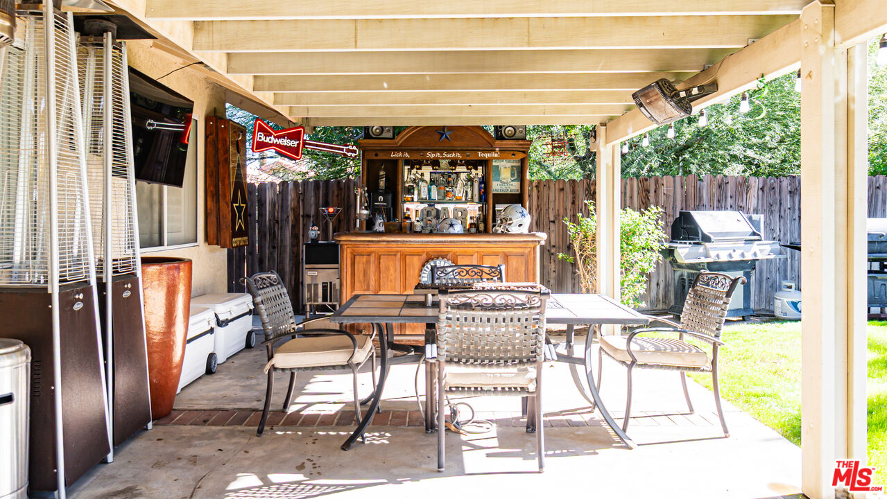 69817 Brookview Way Cathedral City, CA 92234 - Photo 23 of 38 a view of a chairs and table in a patio